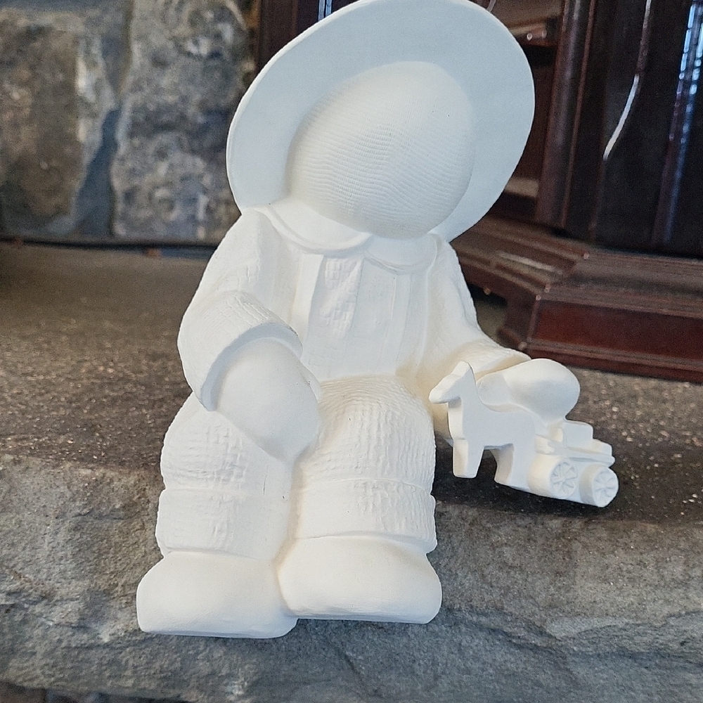 Cream Ceramic Figurine with Toy